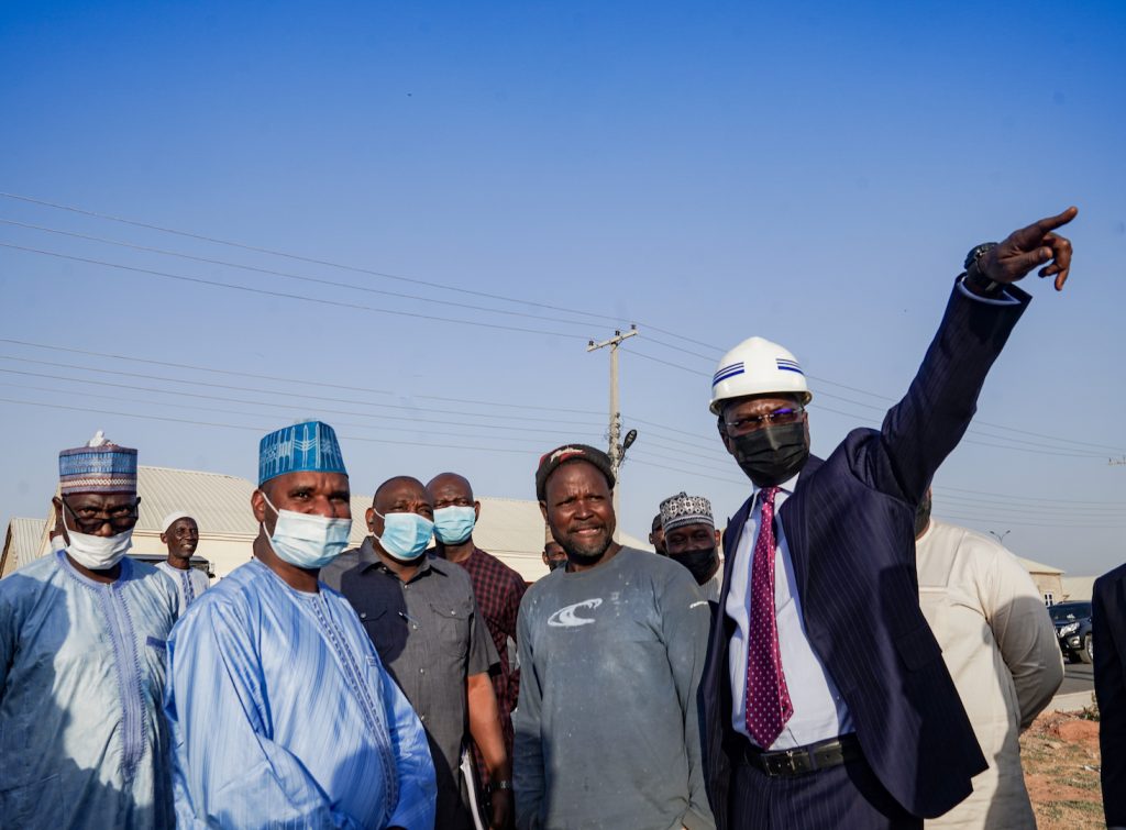 PICTURES: FASHOLA INSPECTS HOMES BUILT UNDER THE FEDERAL GOVERNMENT’S NATIONAL  HOUSING PROGRAMME  IN KANO  STATE