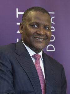 Al_Shabani_at_the_acquisition_of_Dangote_Cement_by_ICD_in_2014_(cropped)